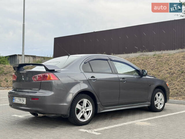 Сірий Міцубісі Lancer, об'ємом двигуна 2 л та пробігом 222 тис. км за 6300 $, фото 12 на Automoto.ua