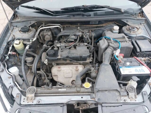 Серый Мицубиси Лансер, объемом двигателя 1.6 л и пробегом 220 тыс. км за 4200 $, фото 5 на Automoto.ua