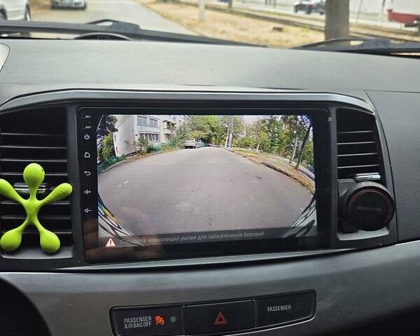 Сірий Міцубісі Lancer, об'ємом двигуна 2 л та пробігом 190 тис. км за 7100 $, фото 11 на Automoto.ua