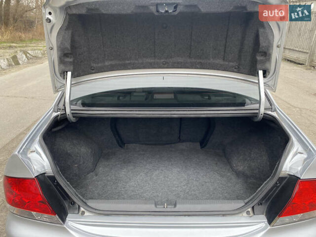 Серый Мицубиси Лансер, объемом двигателя 1.58 л и пробегом 240 тыс. км за 5500 $, фото 5 на Automoto.ua