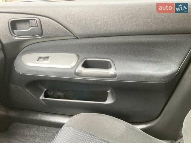 Сірий Міцубісі Lancer, об'ємом двигуна 1.59 л та пробігом 44 тис. км за 6200 $, фото 23 на Automoto.ua