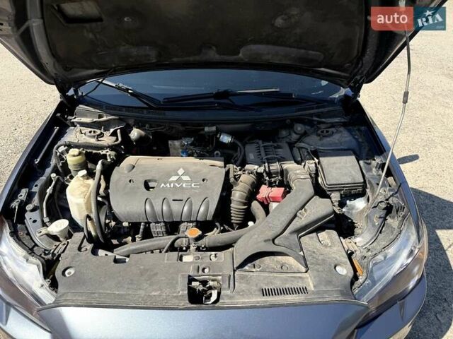 Сірий Міцубісі Lancer, об'ємом двигуна 2 л та пробігом 203 тис. км за 6200 $, фото 13 на Automoto.ua