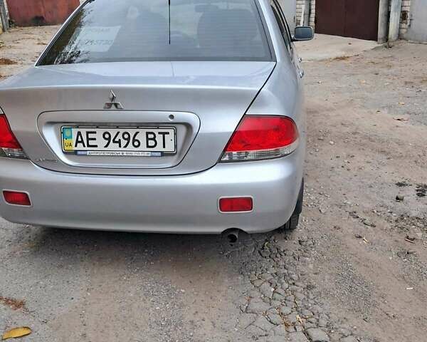 Сірий Міцубісі Lancer, об'ємом двигуна 1.6 л та пробігом 122 тис. км за 5500 $, фото 2 на Automoto.ua