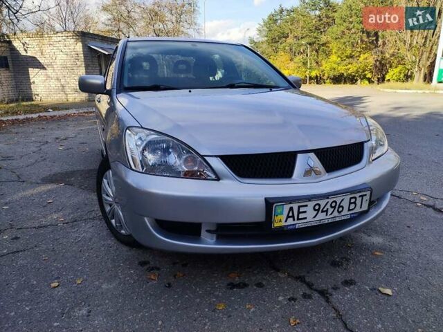 Сірий Міцубісі Lancer, об'ємом двигуна 1.58 л та пробігом 122 тис. км за 6300 $, фото 20 на Automoto.ua