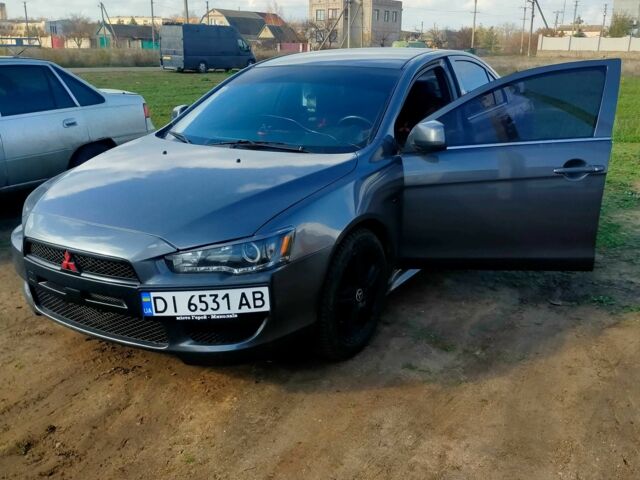 Серый Мицубиси Лансер, объемом двигателя 2 л и пробегом 351 тыс. км за 7000 $, фото 2 на Automoto.ua