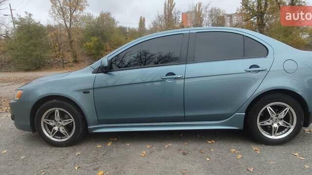 Сірий Міцубісі Lancer, об'ємом двигуна 2 л та пробігом 179 тис. км за 7700 $, фото 11 на Automoto.ua