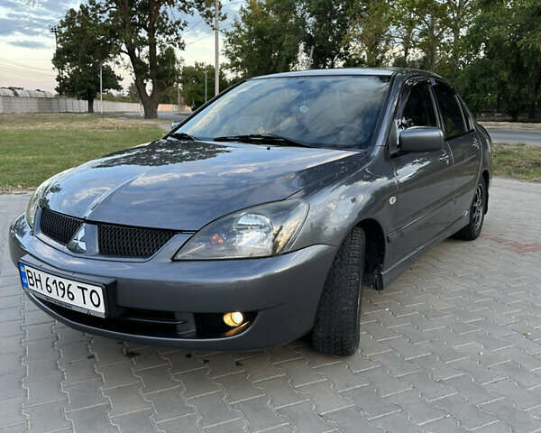 Сірий Міцубісі Lancer, об'ємом двигуна 1.6 л та пробігом 189 тис. км за 6200 $, фото 1 на Automoto.ua