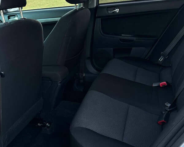 Мицубиси Лансер 2007 в Калуше на Automoto.ua Серый Мицубиси Лансер, объемом двигателя 2 л и пробегом 134 тыс. км за 8950 $, фото 6 на Automoto.ua