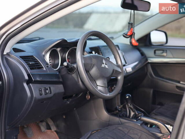 Серый Мицубиси Лансер, объемом двигателя 1.5 л и пробегом 330 тыс. км за 5250 $, фото 8 на Automoto.ua