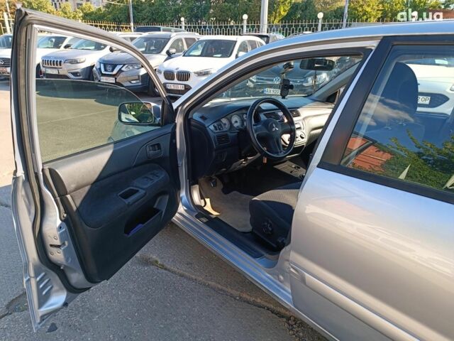 Сірий Міцубісі Lancer, об'ємом двигуна 1.6 л та пробігом 222 тис. км за 3990 $, фото 12 на Automoto.ua
