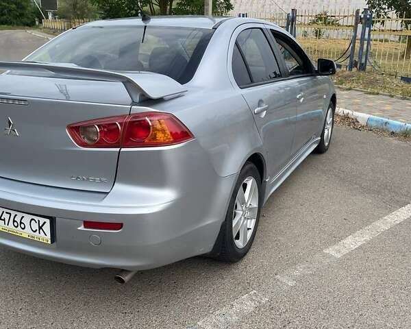 Сірий Міцубісі Lancer, об'ємом двигуна 2 л та пробігом 203 тис. км за 6500 $, фото 4 на Automoto.ua