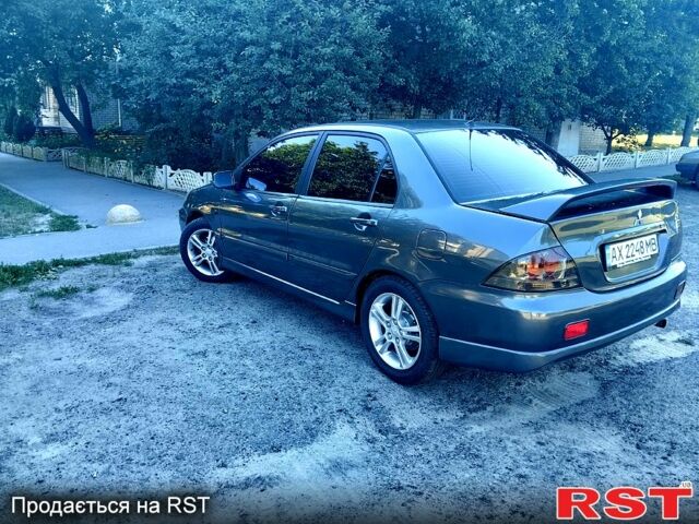 Сірий Міцубісі Lancer, об'ємом двигуна 2 л та пробігом 280 тис. км за 7000 $, фото 7 на Automoto.ua