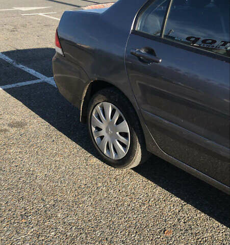 Міцубісі Lancer 2007 у Чернівцях на Automoto.ua Сірий Міцубісі Lancer, об'ємом двигуна 1.6 л та пробігом 269 тис. км за 4200 $, фото 2 на Automoto.ua