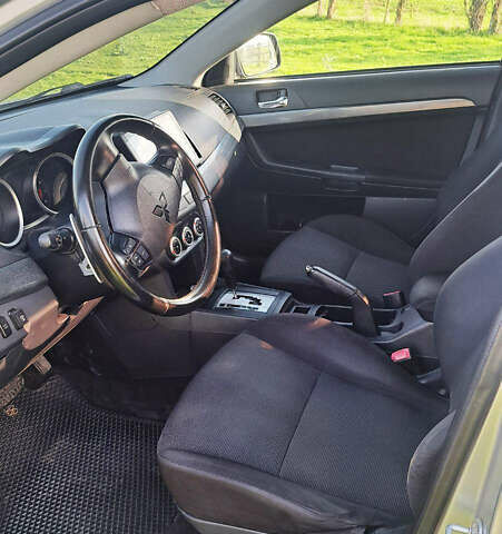 Сірий Міцубісі Lancer, об'ємом двигуна 2 л та пробігом 226 тис. км за 5999 $, фото 4 на Automoto.ua