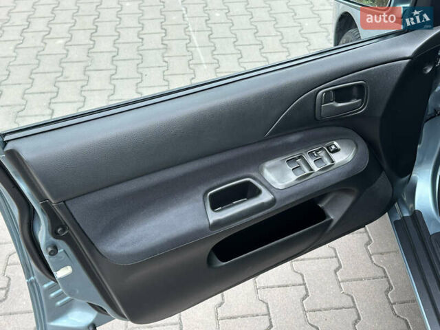 Сірий Міцубісі Lancer, об'ємом двигуна 1.6 л та пробігом 116 тис. км за 5199 $, фото 13 на Automoto.ua