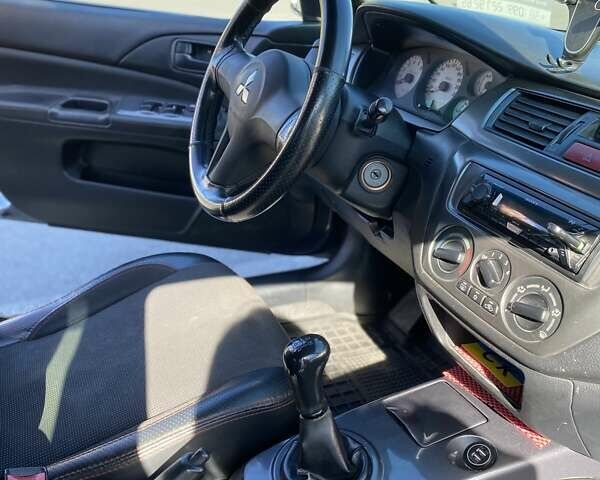 Сірий Міцубісі Lancer, об'ємом двигуна 1.6 л та пробігом 293 тис. км за 5000 $, фото 11 на Automoto.ua