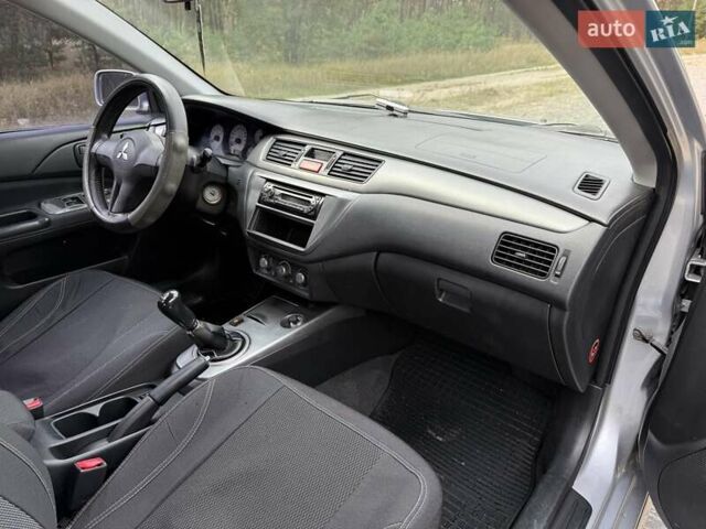 Серый Мицубиси Лансер, объемом двигателя 1.6 л и пробегом 200 тыс. км за 4400 $, фото 19 на Automoto.ua