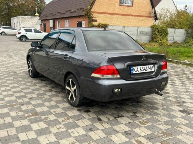 Міцубісі Lancer 2007 у Белой Церкве на Automoto.ua Сірий Міцубісі Lancer, об'ємом двигуна 1.6 л та пробігом 254 тис. км за 3200 $, фото 4 на Automoto.ua