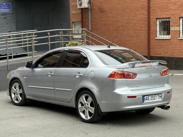 Сірий Міцубісі Lancer, об'ємом двигуна 2 л та пробігом 220 тис. км за 6400 $, фото 5 на Automoto.ua