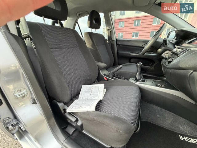 Серый Мицубиси Лансер, объемом двигателя 1.3 л и пробегом 160 тыс. км за 5555 $, фото 67 на Automoto.ua