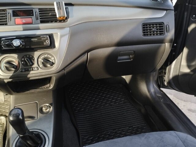 Сірий Міцубісі Lancer, об'ємом двигуна 1.6 л та пробігом 178 тис. км за 5464 $, фото 10 на Automoto.ua