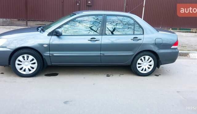 Міцубісі Lancer 2007 у Хмельницькому на Automoto.ua Сірий Міцубісі Lancer, об'ємом двигуна 1.58 л та пробігом 143 тис. км за 4100 $, фото 4 на Automoto.ua