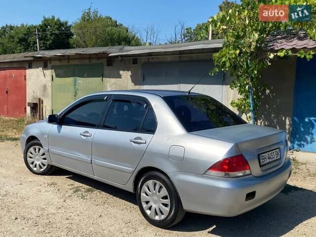 Сірий Міцубісі Lancer, об'ємом двигуна 1.6 л та пробігом 381 тис. км за 3350 $, фото 2 на Automoto.ua