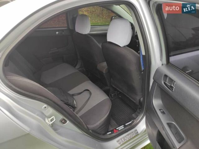 Сірий Міцубісі Lancer, об'ємом двигуна 2 л та пробігом 124 тис. км за 7499 $, фото 14 на Automoto.ua