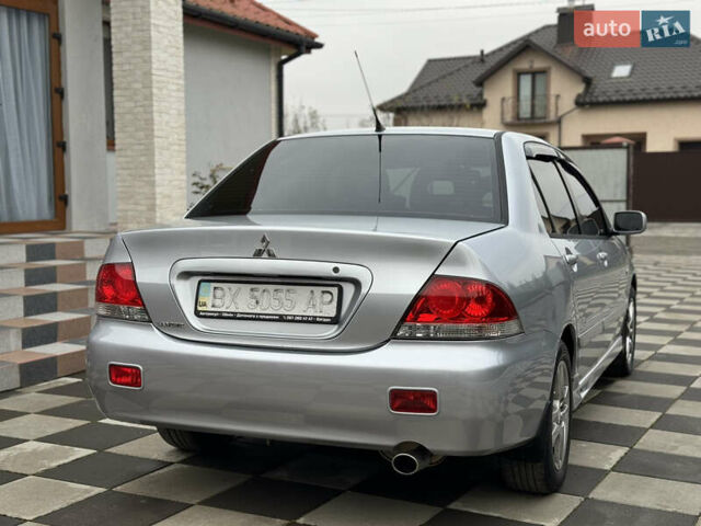 Сірий Міцубісі Lancer, об'ємом двигуна 1.6 л та пробігом 281 тис. км за 3999 $, фото 10 на Automoto.ua