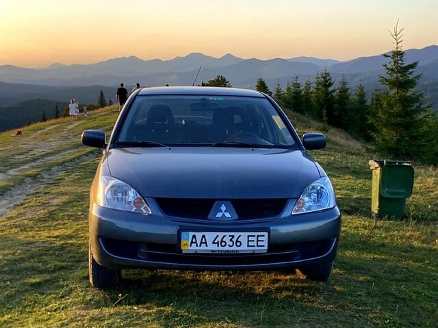 Сірий Міцубісі Lancer, об'ємом двигуна 1.6 л та пробігом 240 тис. км за 4450 $, фото 6 на Automoto.ua