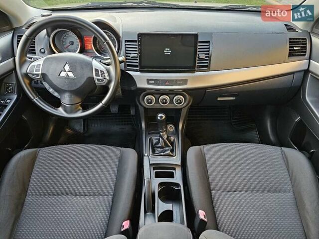Серый Мицубиси Лансер, объемом двигателя 2 л и пробегом 282 тыс. км за 5450 $, фото 48 на Automoto.ua