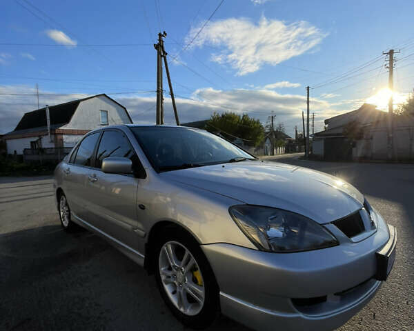 Мицубиси Лансер 2007 в Василькове на Automoto.ua Серый Мицубиси Лансер, объемом двигателя 2 л и пробегом 177 тыс. км за 5399 $, фото 7 на Automoto.ua