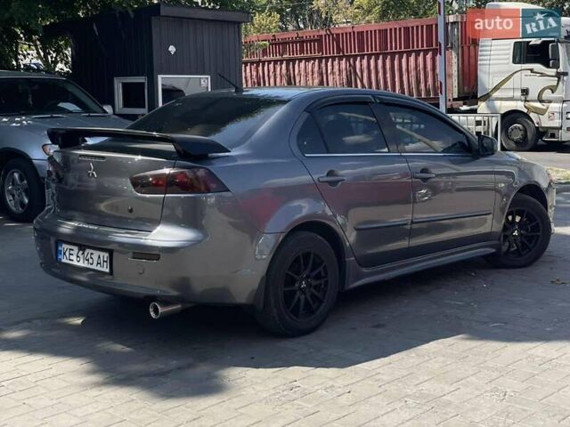 Сірий Міцубісі Lancer, об'ємом двигуна 2 л та пробігом 203 тис. км за 6999 $, фото 3 на Automoto.ua