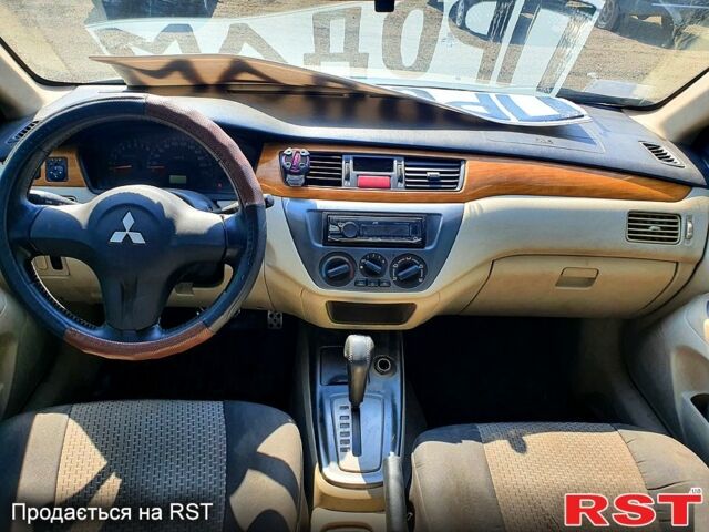 Мицубиси Лансер 2007 в Николаеве на Automoto.ua Серый Мицубиси Лансер, объемом двигателя 1.6 л и пробегом 214 тыс. км за 2700 $, фото 4 на Automoto.ua