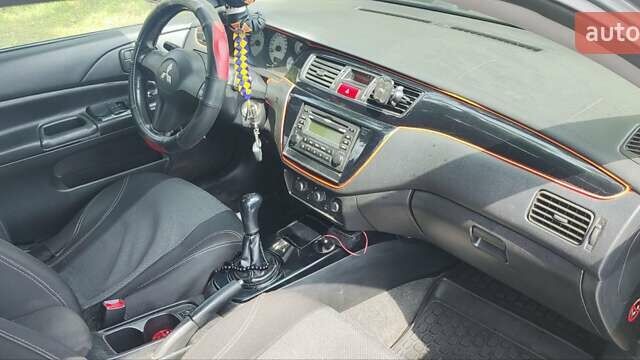 Сірий Міцубісі Lancer, об'ємом двигуна 1.6 л та пробігом 234 тис. км за 4500 $, фото 7 на Automoto.ua