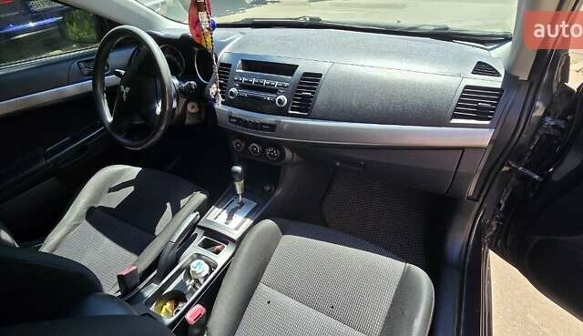 Сірий Міцубісі Lancer, об'ємом двигуна 1.5 л та пробігом 211 тис. км за 5600 $, фото 5 на Automoto.ua