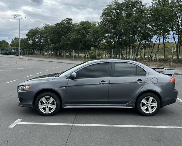 Сірий Міцубісі Lancer, об'ємом двигуна 2 л та пробігом 300 тис. км за 6299 $, фото 3 на Automoto.ua