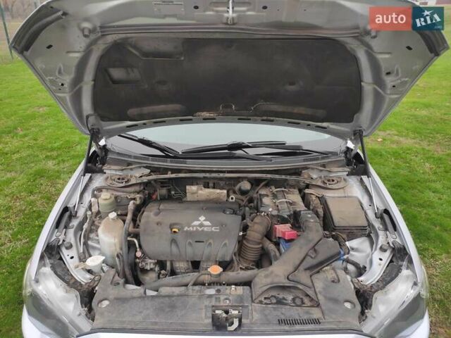 Сірий Міцубісі Lancer, об'ємом двигуна 2 л та пробігом 124 тис. км за 7499 $, фото 17 на Automoto.ua