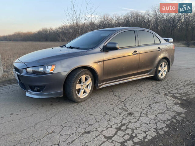 Сірий Міцубісі Lancer, об'ємом двигуна 2 л та пробігом 205 тис. км за 7000 $, фото 15 на Automoto.ua