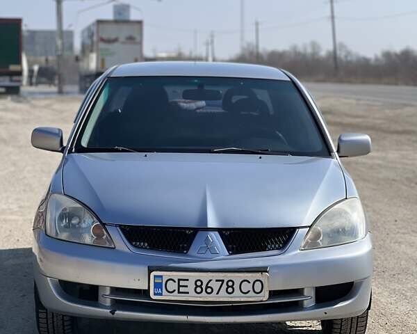 Сірий Міцубісі Lancer, об'ємом двигуна 1.6 л та пробігом 163 тис. км за 5000 $, фото 3 на Automoto.ua