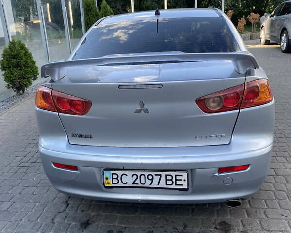 Серый Мицубиси Лансер, объемом двигателя 2 л и пробегом 215 тыс. км за 5750 $, фото 2 на Automoto.ua