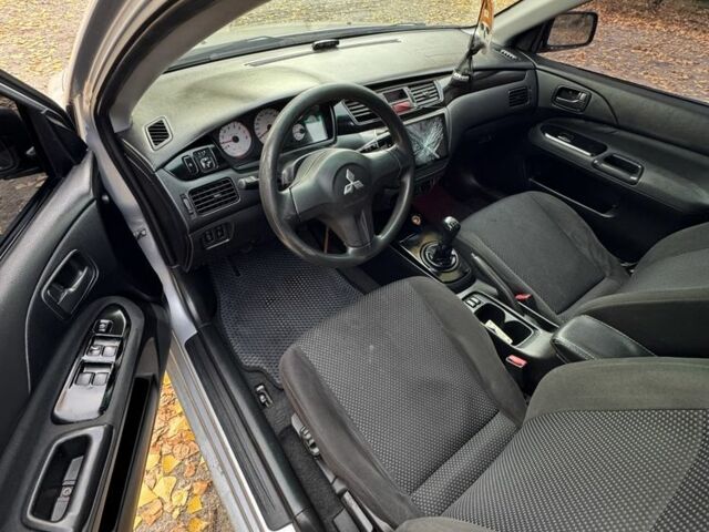 Сірий Міцубісі Lancer, об'ємом двигуна 1.6 л та пробігом 180 тис. км за 2500 $, фото 4 на Automoto.ua