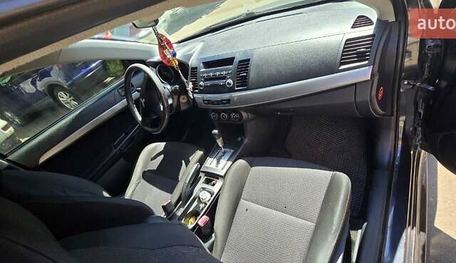 Сірий Міцубісі Lancer, об'ємом двигуна 1.5 л та пробігом 211 тис. км за 5600 $, фото 4 на Automoto.ua