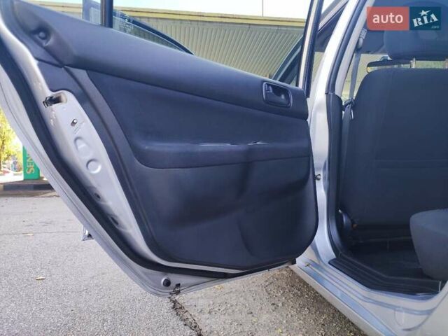 Сірий Міцубісі Lancer, об'ємом двигуна 1.58 л та пробігом 122 тис. км за 6300 $, фото 47 на Automoto.ua