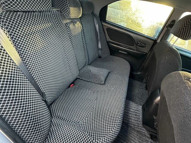 Серый Мицубиси Лансер, объемом двигателя 1.6 л и пробегом 280 тыс. км за 4600 $, фото 13 на Automoto.ua