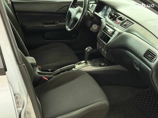 Серый Мицубиси Лансер, объемом двигателя 1.6 л и пробегом 174 тыс. км за 5990 $, фото 11 на Automoto.ua