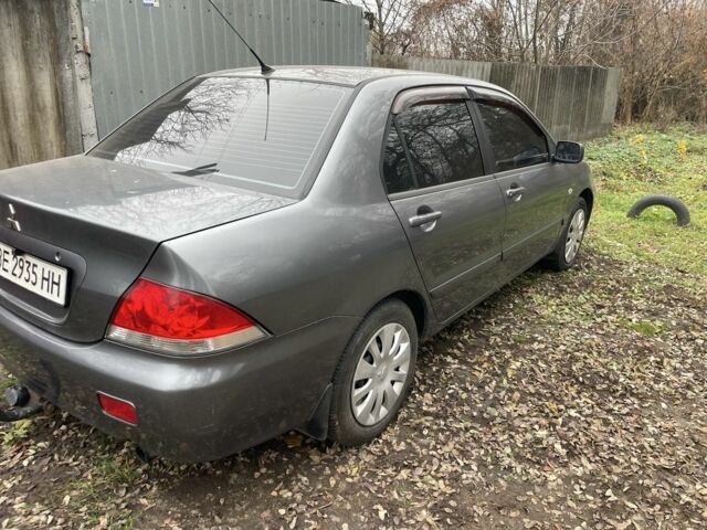 Сірий Міцубісі Lancer, об'ємом двигуна 1.6 л та пробігом 290 тис. км за 3600 $, фото 1 на Automoto.ua