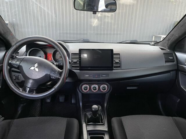 Серый Мицубиси Лансер, объемом двигателя 2 л и пробегом 244 тыс. км за 6500 $, фото 4 на Automoto.ua