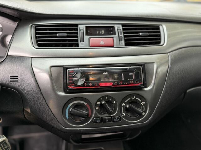 Сірий Міцубісі Lancer, об'ємом двигуна 1.6 л та пробігом 247 тис. км за 4900 $, фото 7 на Automoto.ua