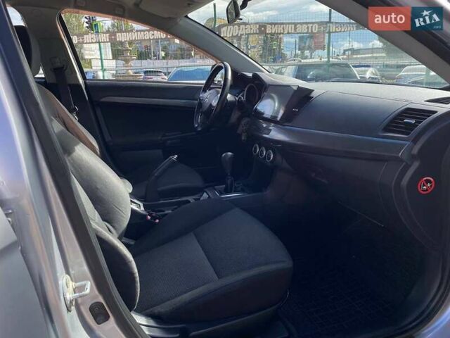 Серый Мицубиси Лансер, объемом двигателя 2 л и пробегом 150 тыс. км за 6100 $, фото 16 на Automoto.ua